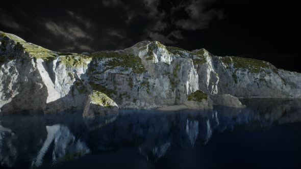 Fjord with Dark Storm Clouds