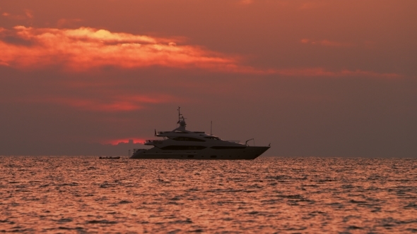 Red Sunset And Yacht