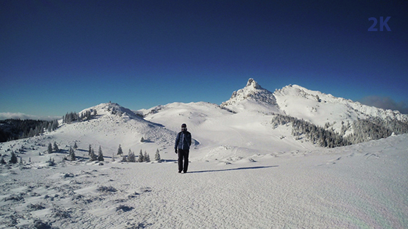 Traveler in Winter Mountain