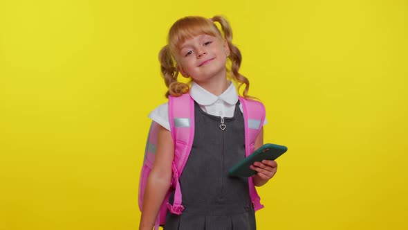 Teenage Girl Kid in School Uniform Using Credit Bank Card and Smartphone Purchases Online Shopping