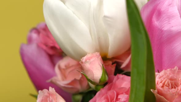 Side of Bouquet Flower with Roses and Tulips, on Yellow, Rotation, Close Up