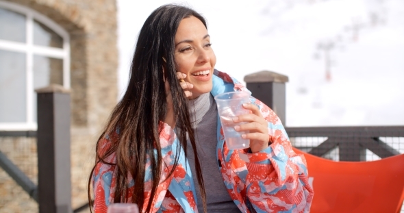 Young Woman Chatting On Her Mobile alt