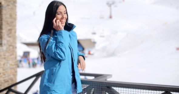 Attractive Young Woman At a Mountain Ski Resort