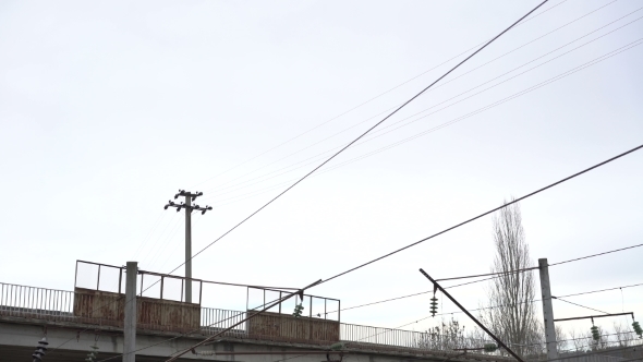 High-voltage Network, Isolators, Bridge, Road In The Ukrainian Village. 