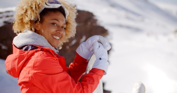 Smiling Woman On a Ski Slope alt