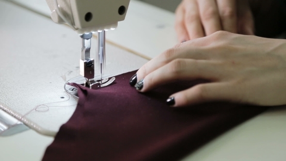 Stitching On A Sewing Machine. Piece Of Clothing