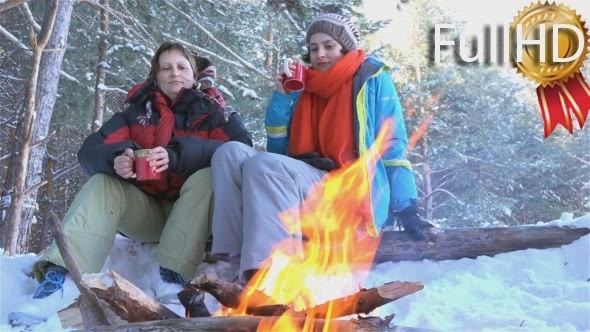 Two Women in The Winter, at a Picnic, Drinking