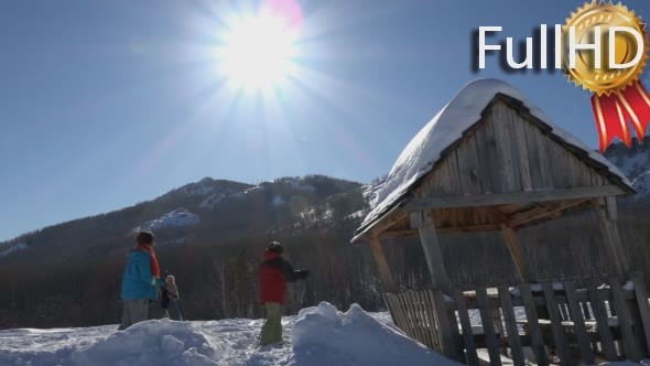 Two Women Skiing,mountains in The Background