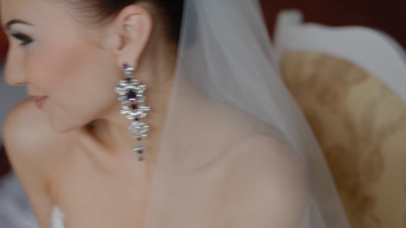 Happy Bride Pose To Photographer Indoor