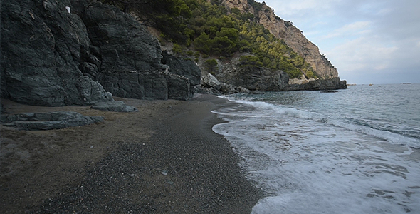 Walking along a Black Beach