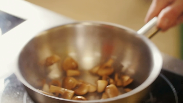 Roasting Mushrooms In a Frying Pan.