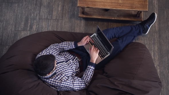 The Man Lies On a Chair And Buy Online. alt