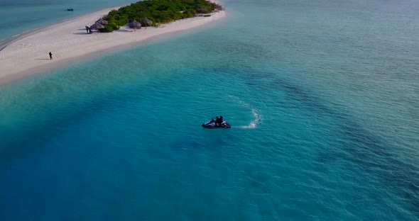 Natural fly over abstract shot of a sunshine white sandy paradise beach and aqua turquoise water 