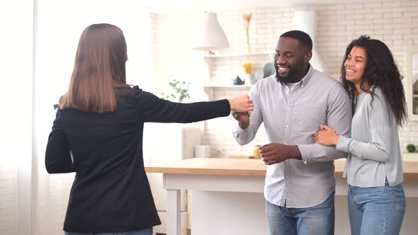 Happy Multiracial Couple Moving in the New House