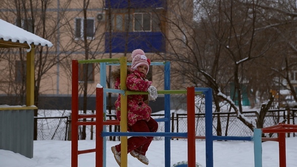 Girl Playing on the Sports Playground