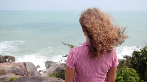 Young Woman Enjoying Sea View On Vacation  
