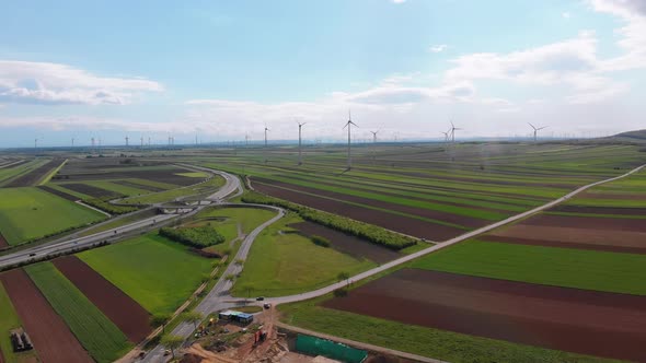 Aerial View of Wind Turbines Farm and Agricultural Fields. Austria.