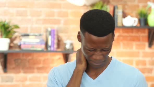 Tired Black Young Man, Neck pain, Portrait