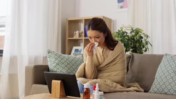 Sick Woman Having Video Call on Tablet Pc at Home