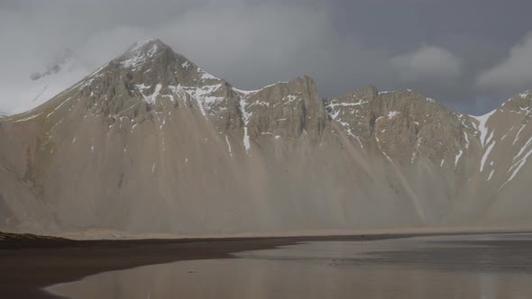 Drone Over Beach With Vestrahorn Mountain And Sea