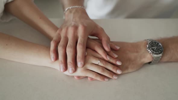 Closeup Caucasian Hands of Man and Woman Touching Hugging Tightly