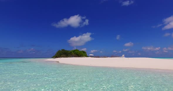 Natural overhead abstract shot of a white sand paradise beach and turquoise sea background in high r