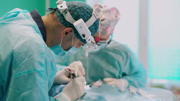 Team surgeon at work in operating room