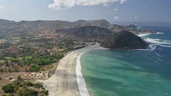 Trees By the Seashore with Boats Along the Ocean Waters in Lombok, Indonesia