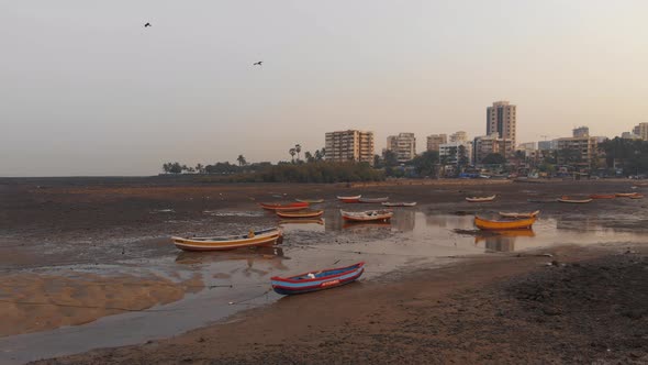 Drone shot over beached fishing Boats Mumbai