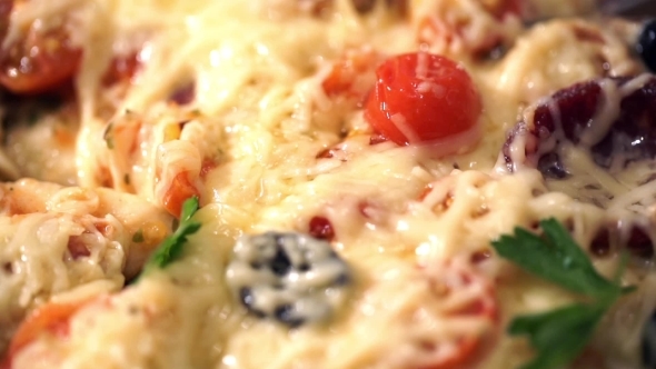 Pizza With Ham, Tomato And Olives