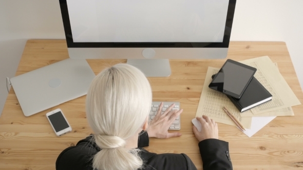 Top View Freelancer Working Typing Laptop Keyboard in Office