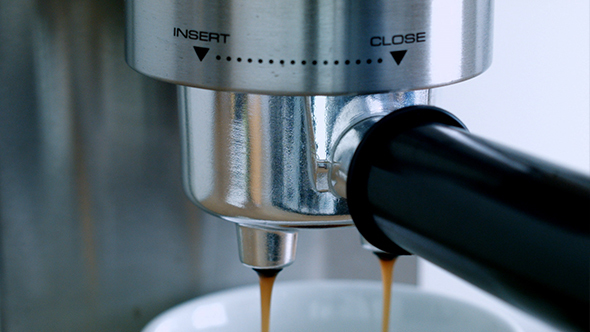 Making Espresso Coffee Using Coffee Machine