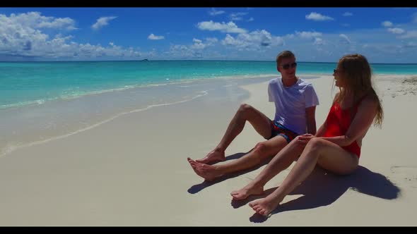 Romantic couple happy together on marine sea view beach lifestyle by transparent sea with white sand