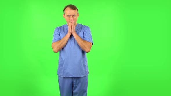 Medical Man Thinks About Something, and Then an Idea Comes To Him. Green Screen