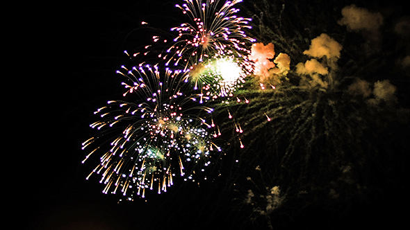 Colorful Fireworks of Various Colors over Night Sky