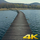 Flying Above The Lake With Wood Bridge - VideoHive Item for Sale