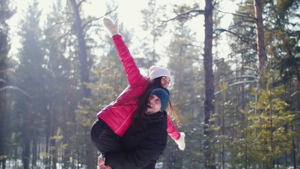 Man Carries His Girlfriend On His Back