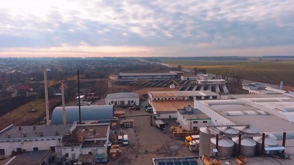 Solar energy farm. Aerial view of factory roof with solar panels