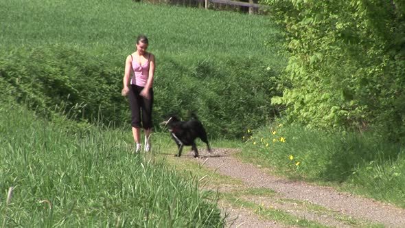 Dog Running down a Girl