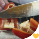 Chef Cutting Red Pepper on Kitchen Table - VideoHive Item for Sale