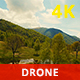 Aerial View of a Beautiful Valley and Mountains in a Sunny Day - VideoHive Item for Sale