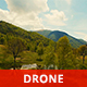 Aerial View of a Beautiful Valley and Mountains in a Sunny Day - VideoHive Item for Sale