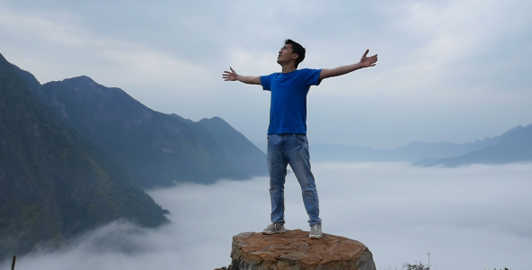 Freedom On The Top Of Mountain With Clouds