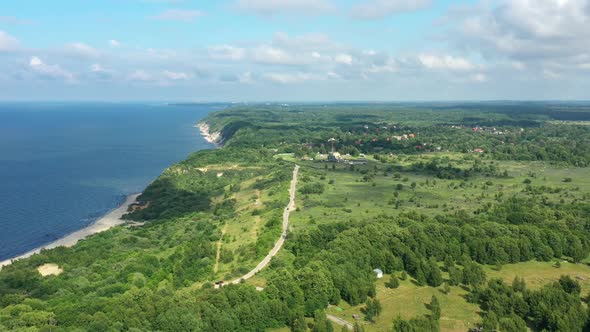 Baltic Coastline with Green Summer Forest and the Sea