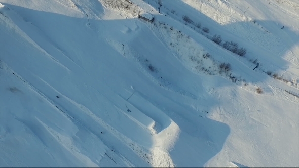 Flight Over The Snowboard Park. Springboards