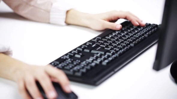 Woman Hands Typing On Computer Keyboard At Office