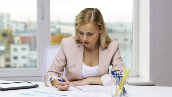 Businesswoman Or Student With Papers Tablet Pc