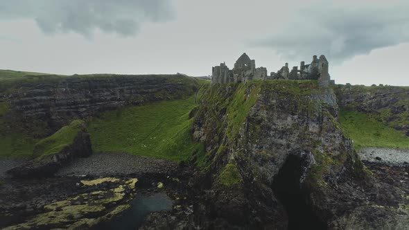 Closeup Ruins Dunluce Castle Aerial View Two Round Towers on Eastern Side of Building Ireland