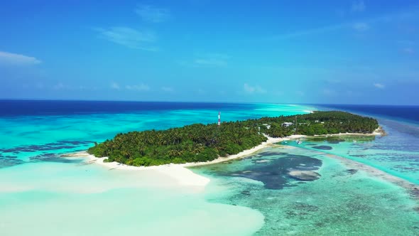 Aerial view nature of tranquil shore beach adventure by blue water with white sandy background of a 