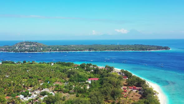 Aerial seascape of beautiful resort beach lifestyle by blue water and clean sand background of a day